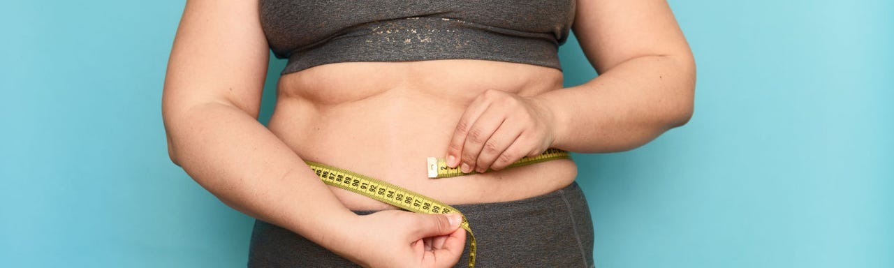 Mulher em conversa com o médico