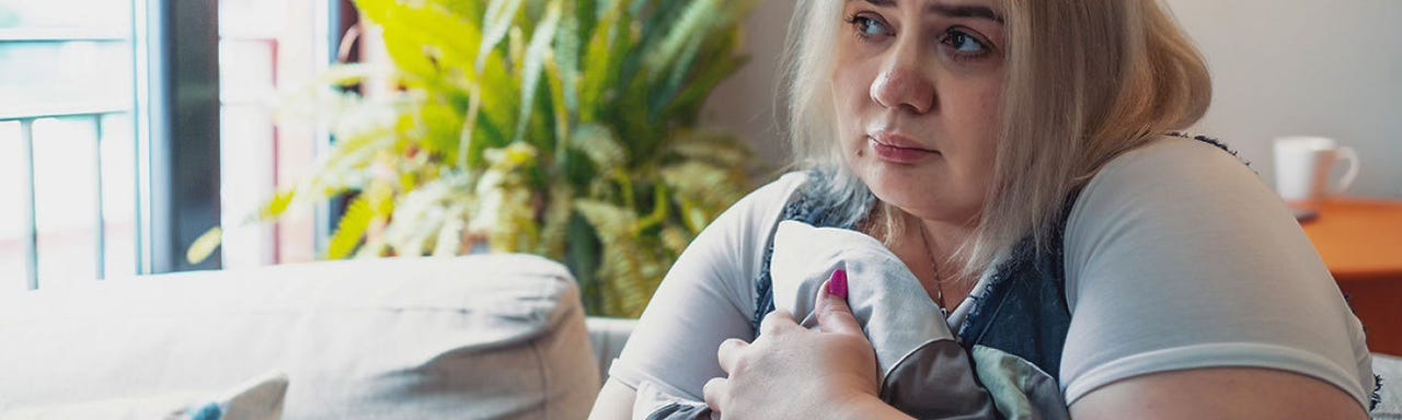 Mulher em conversa com o médico